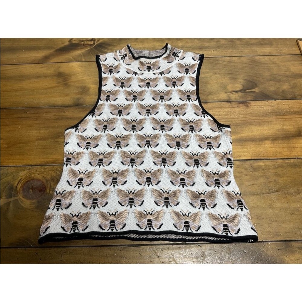 Anthropologie brand Maeve moth top